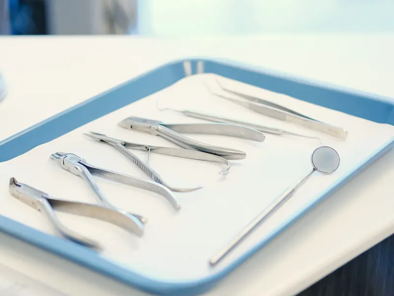 Sterilised instruments laid out on a tray.